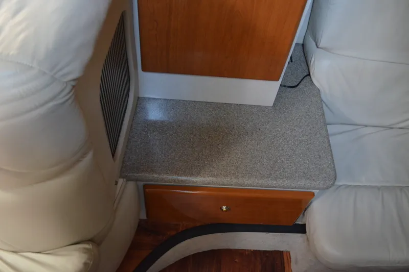 Slide: The Image of Interior of 2002 Formula 37 Performance Cruiser with beige seating and wood accents. - 54