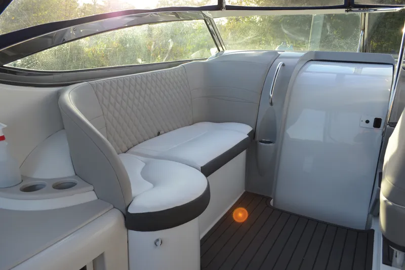 Slide: The Image of Interior of a 2002 Formula 37 Performance Cruiser with elegant seating and modern design. - 22