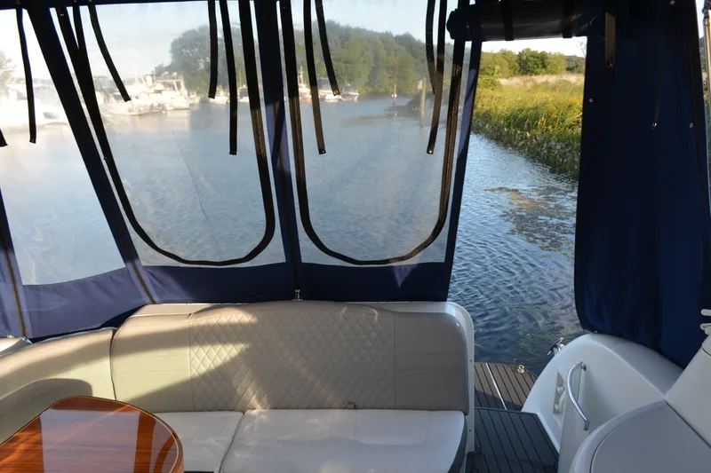 Slide: The Image of 2002 Formula 37 Performance Cruiser interior with water view through clear canopy. - 15