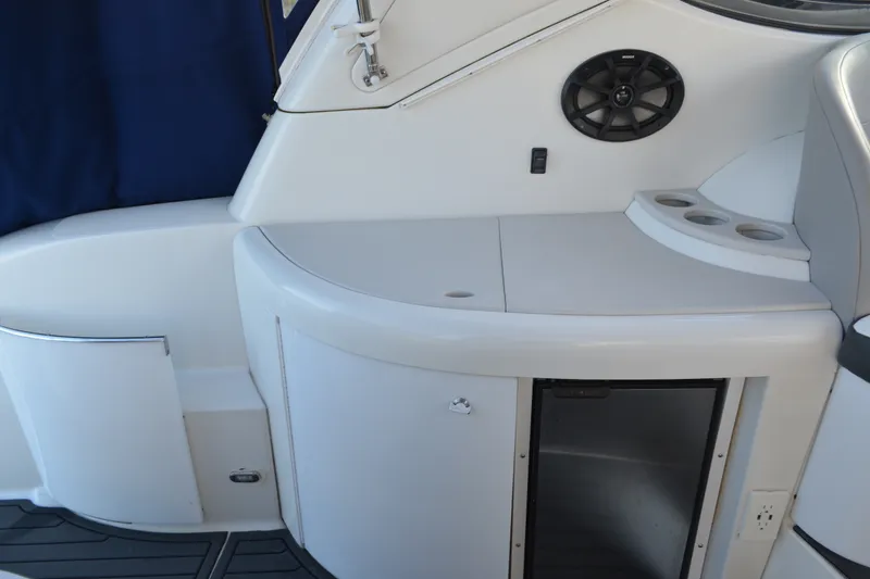 Slide: The Image of 2002 Formula 37 Performance Cruiser interior with seating, speaker, and storage compartments. - 17
