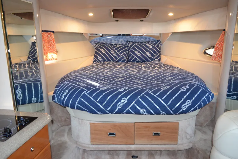 Slide: The Image of Luxurious cabin interior of a 2002 Formula 37 Performance Cruiser with cozy bedding. - 46