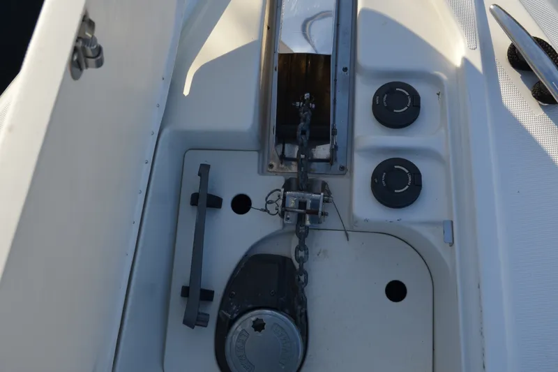 Slide: The Image of Anchor chain compartment on a 2002 Formula 37 Performance Cruiser boat. - 7