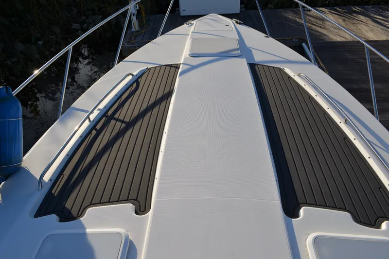Slide: The Image of 2002 Formula 37 Performance Cruiser deck with non-slip surface and railing. - 6