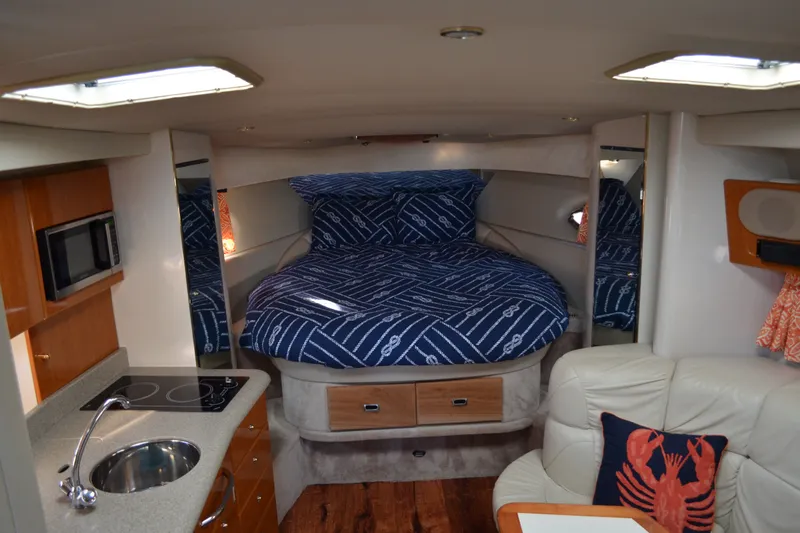 Slide: The Image of Interior of 2002 Formula 37 Performance Cruiser with cozy bed and kitchenette. - 45