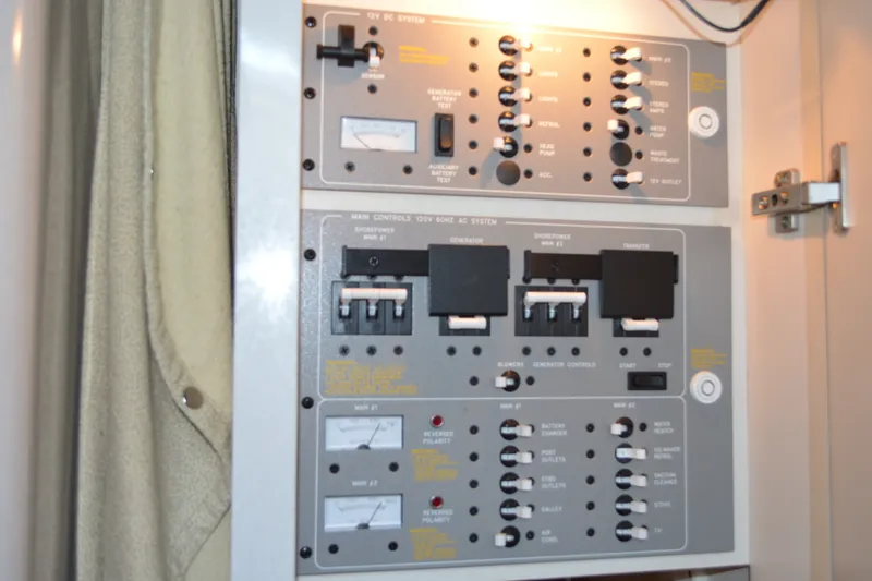 Slide: The Image of Electrical control panel on a 2002 Formula 37 Performance Cruiser boat. - 55