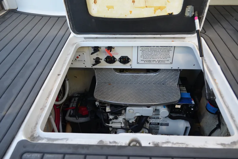 Slide: The Image of Engine compartment of a 2002 Formula 37 Performance Cruiser with Kohler power system. - 74