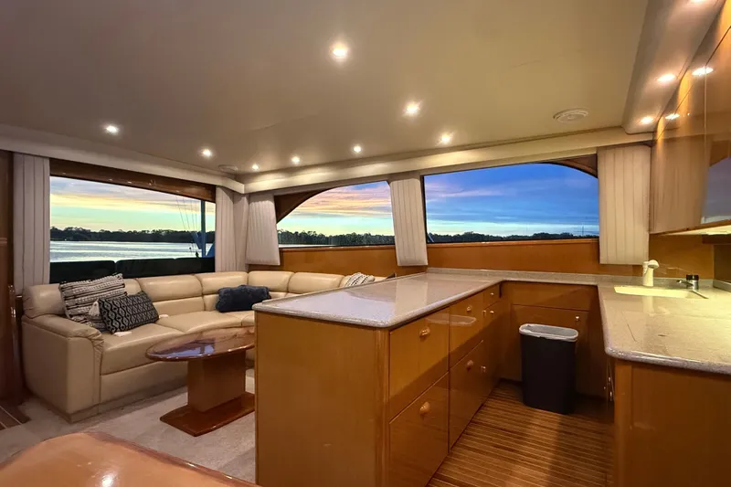 Slide: The Image of Luxurious interior of 2002 Viking 52 Convertible yacht with sunset view. - 20