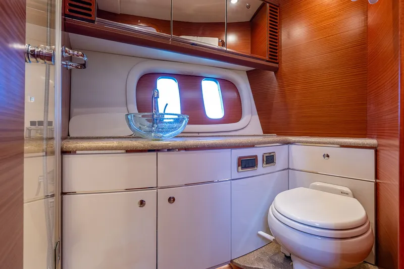 Slide: The Image of Luxurious bathroom interior of 2014 Zeelander Z44 yacht with modern fixtures and wood accents. - 55