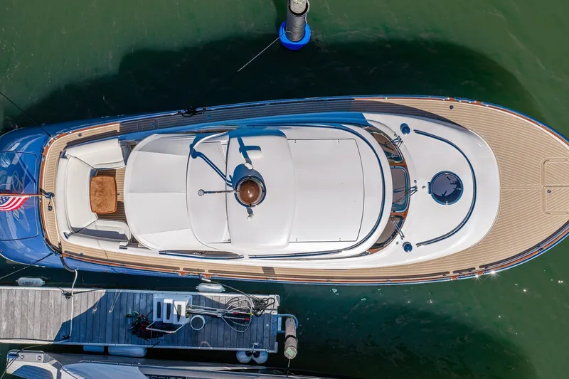 Slide: The Image of Overhead view of a 2014 Zeelander Z44 yacht docked in a marina. - 1
