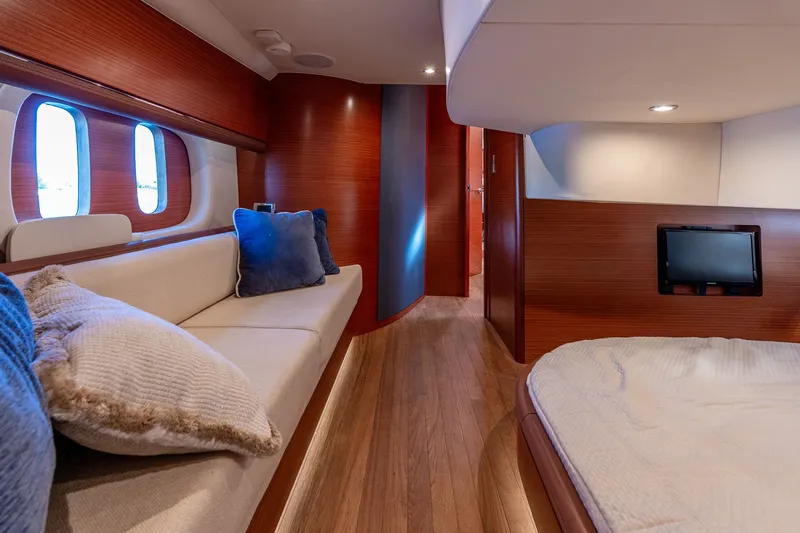 Slide: The Image of Luxurious interior of 2014 Zeelander Z44 yacht with wood paneling and cozy seating. - 59