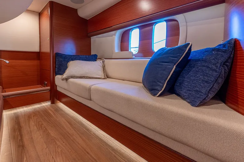 Slide: The Image of Luxurious interior of 2014 Zeelander Z44 yacht with plush seating and elegant wood finish. - 58