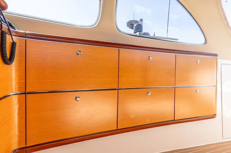 Slide: The Image of Luxurious wooden cabinetry inside a 2014 Zeelander Z44 yacht, showcasing elegant design. - 44
