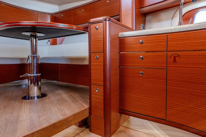 Slide: The Image of Luxurious 2014 Zeelander Z44 yacht interior with elegant wood cabinetry and modern design. - 49