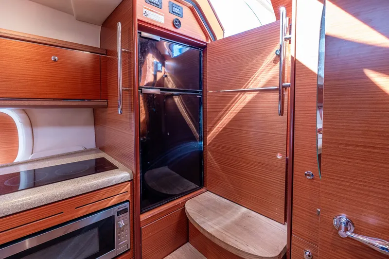 Slide: The Image of Luxurious 2014 Zeelander Z44 yacht interior with modern kitchen amenities. - 42