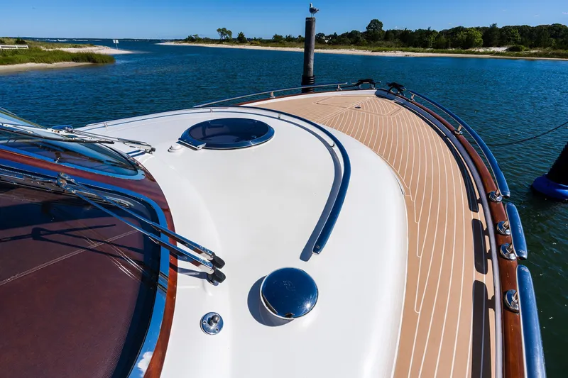 Slide: The Image of 2014 Zeelander Z44 yacht deck with sleek design and scenic water view. - 11