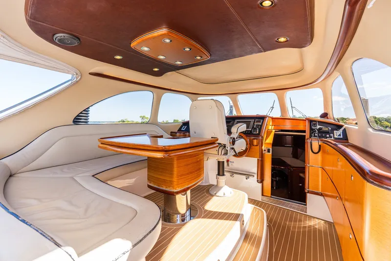 Slide: The Image of Luxurious 2014 Zeelander Z44 yacht interior with elegant wood finishes and plush seating. - 38