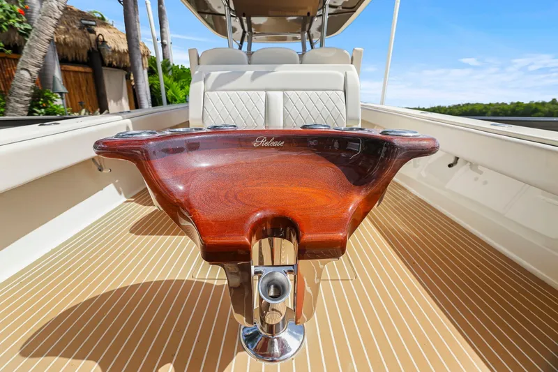 Slide: The Image of Luxurious 2013 Bahama 41 boat interior with polished wood accents and comfortable seating. - 26