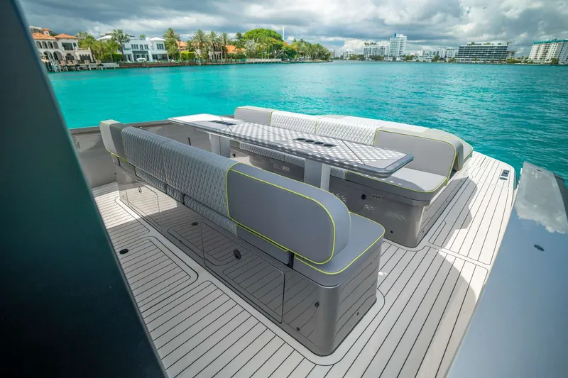 Slide: The Image of Luxurious 2024 Maori 46ft yacht deck with elegant seating and scenic waterfront view. - 25
