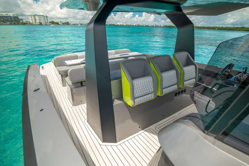 Slide: The Image of 2024 Maori 46ft yacht with modern seating on turquoise water. - 29