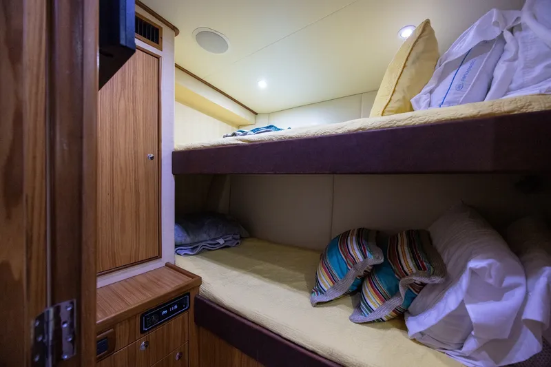 Slide: The Image of Cozy 2008 B&D Convertible cabin with wooden interior and bunk beds. - 43
