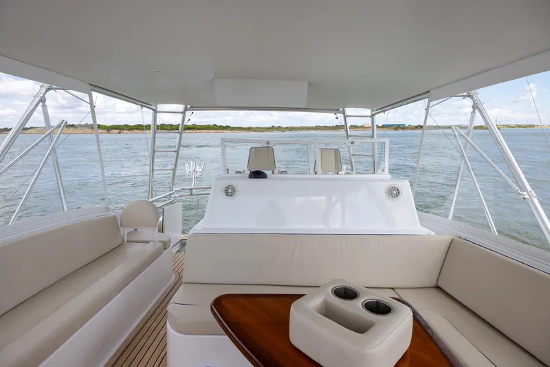 Slide: The Image of Luxurious 2008 B&D Convertible yacht interior with plush seating and ocean view. - 54