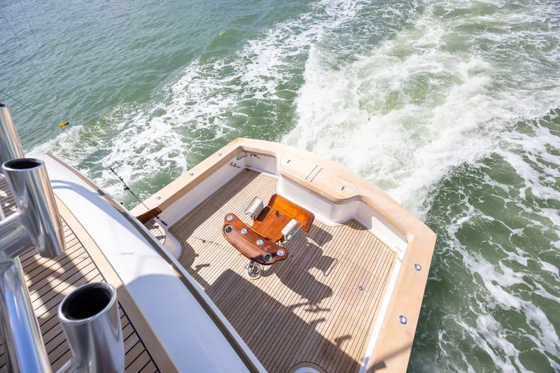 Slide: The Image of 2008 B&D Convertible yacht deck with fishing chair, cruising on open water. - 25