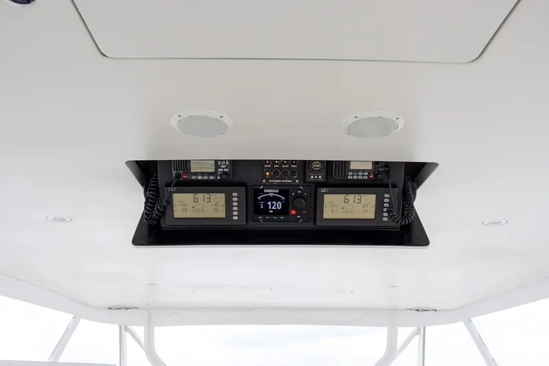 Slide: The Image of Ceiling-mounted navigation equipment in a 2008 B&D Convertible boat. - 58