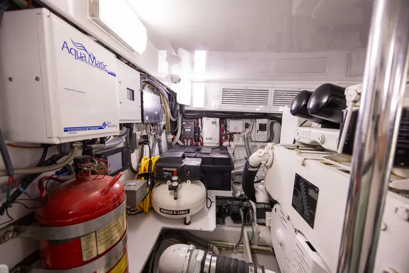 Slide: The Image of Engine room of a 2008 B&D Convertible boat with Aqua Matic system and equipment. - 66