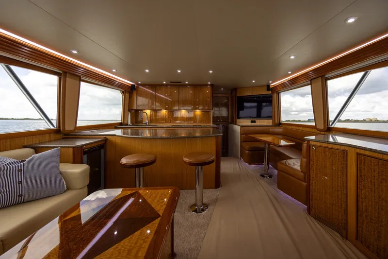 Slide: The Image of Luxurious interior of 2008 B&D Convertible yacht with elegant wood finishes and modern amenities. - 29