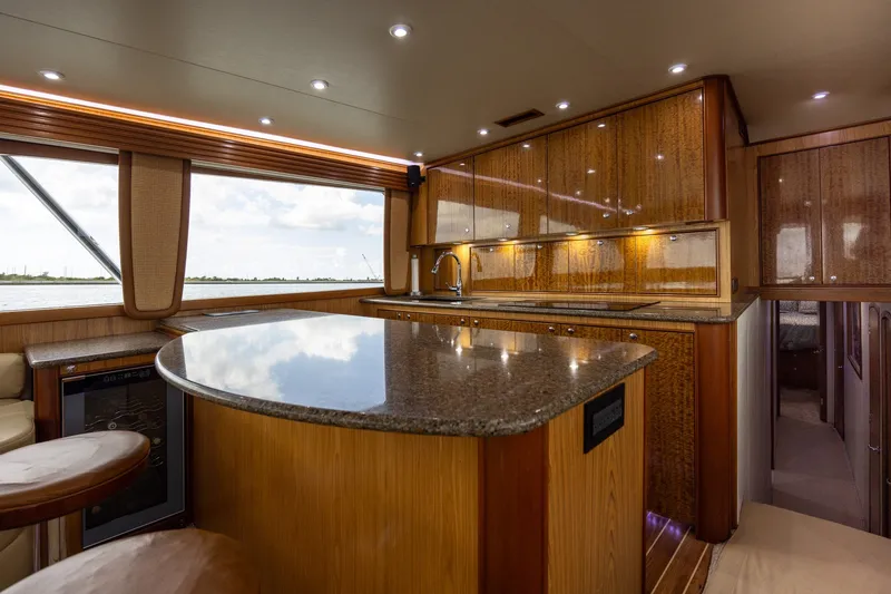 Slide: The Image of Luxurious 2008 B&D Convertible yacht interior with modern kitchen and elegant wood finishes. - 30