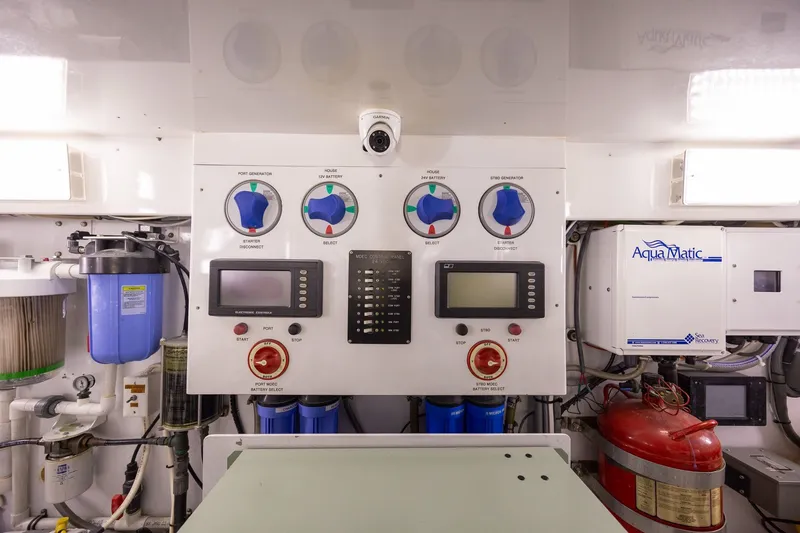Slide: The Image of Control panel in a 2008 B&D Convertible engine room with Aqua Matic system. - 62