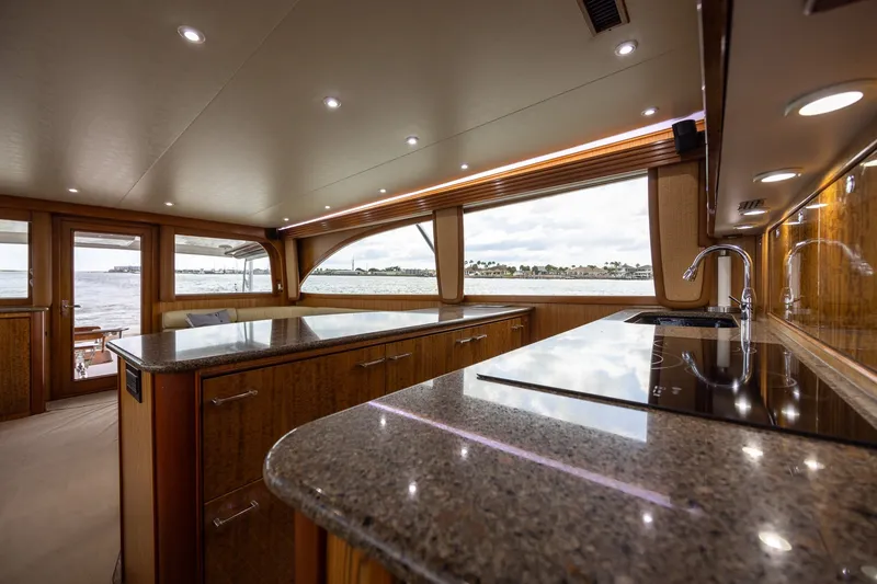 Slide: The Image of Luxurious 2008 B&D Convertible yacht interior with modern kitchen and ocean view. - 31