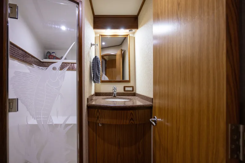 Slide: The Image of Luxurious bathroom in 2008 B&D Convertible with etched glass shower and wooden cabinetry. - 45