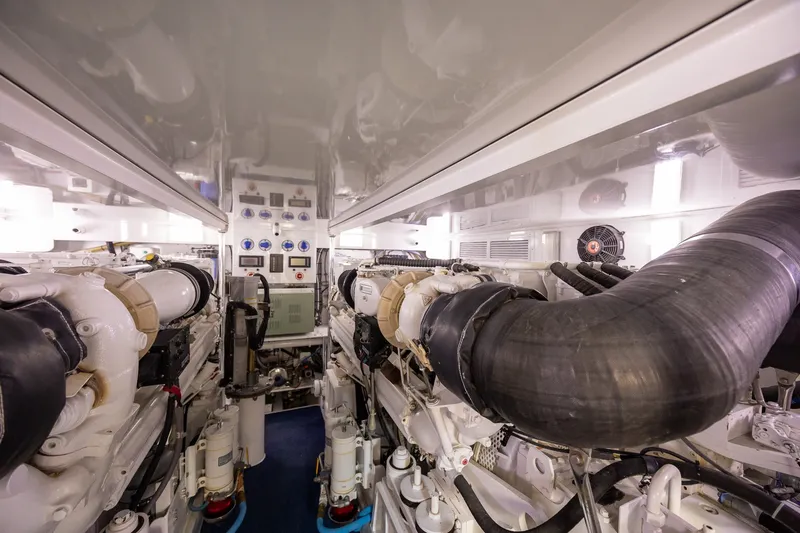 Slide: The Image of Engine room of 2008 B&D Convertible, showcasing dual engines and control panels. - 70