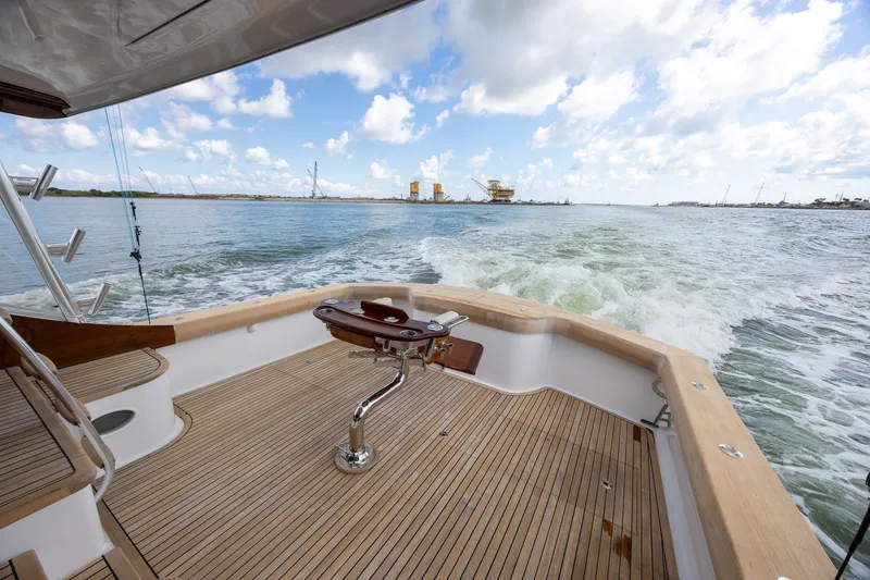 Slide: The Image of 2008 B&D Convertible yacht deck with ocean view and fishing chair. - 21