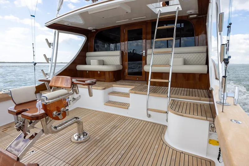 Slide: The Image of Luxurious 2008 B&D Convertible yacht deck with wooden flooring and seating. - 17