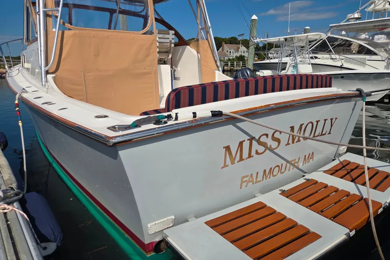 Slide: The Image of Fortier Express 33 boat named "Miss Molly" docked in Falmouth, MA, 1999 model. - 9