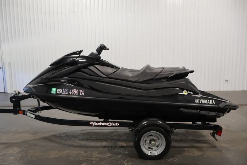Slide: The Image of 2024 Yamaha WaveRunner GP SVHO in black on trailer, side view. - 14