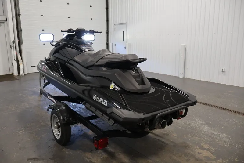 Slide: The Image of 2024 Yamaha WaveRunner GP SVHO in a garage, mounted on a trailer. - 5