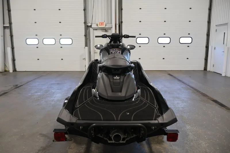 Slide: The Image of 2024 Yamaha WaveRunner GP SVHO in a garage, rear view showcasing sleek design. - 3