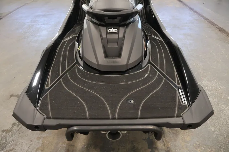 Slide: The Image of 2024 Yamaha WaveRunner GP SVHO, rear view, showcasing sleek design and textured deck. - 15