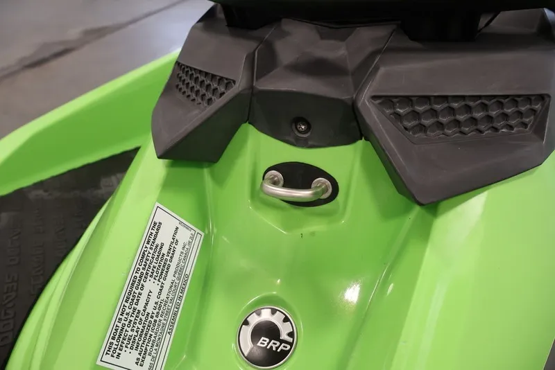 Slide: The Image of Close-up of 2018 Sea-Doo GTR-X 230, featuring green body and BRP logo. - 17