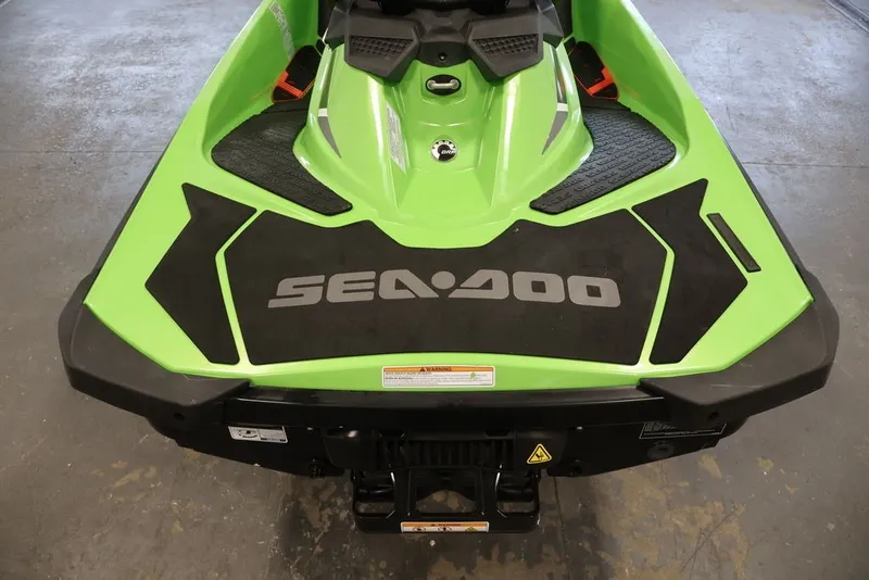 Slide: The Image of 2018 Sea-Doo GTR-X 230 in vibrant green, showcasing sleek design and branding. - 21