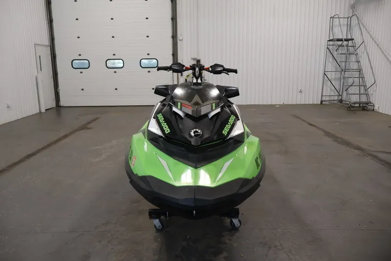 Slide: The Image of 2018 Sea-Doo GTR-X 230 jet ski in a garage, front view. - 2