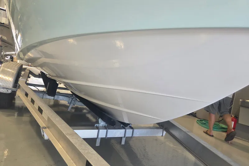 Slide: The Image of 2007 Everglades 211 Center Console boat on trailer, viewed from below. - 21