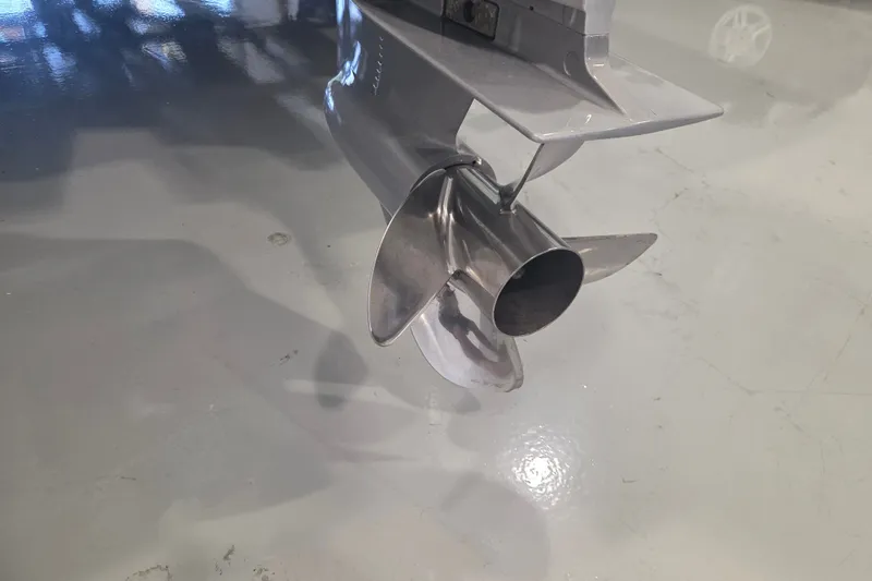 Slide: The Image of Close-up of a 2007 Everglades 211 Center Console boat propeller on a shiny floor. - 22