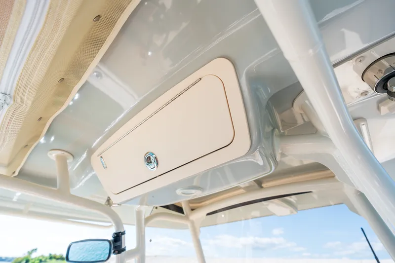 Slide: The Image of 2023 Grady-White Canyon 271 FS boat interior storage compartment detail. - 15