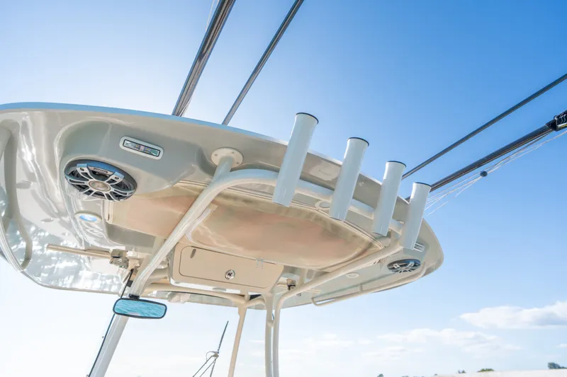 Slide: The Image of 2023 Grady-White Canyon 271 FS boat top view with rod holders and speakers. - 16