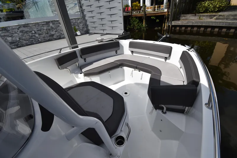 Slide: The Image of 2022 Jeanneau 7.5 Leader boat with spacious seating area. - 1