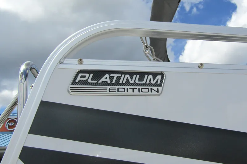 Slide: The Image of 2026 Tahoe Pontoon Sport 85 Versatile Rear Bench, Platinum Edition badge detail. - 8